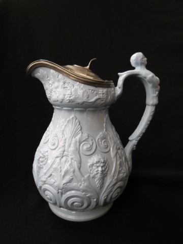 Appraisal: English Relief Pitcher mid th century light blue Bacchus grape