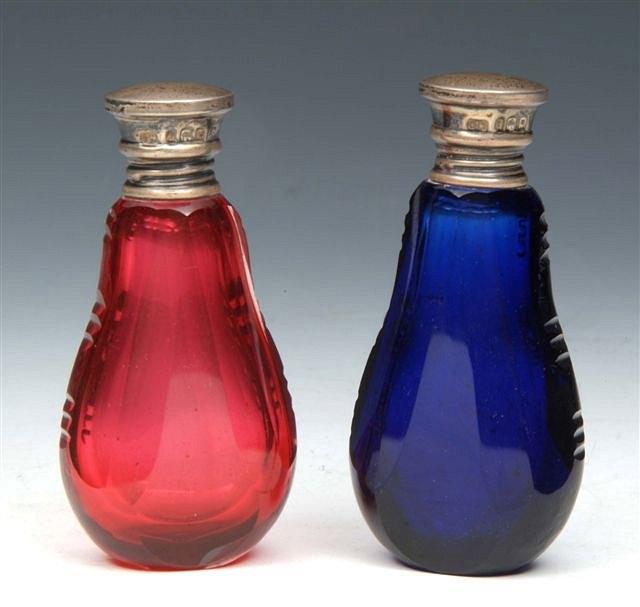 Appraisal: TWO VICTORIAN RED AND BLUE GLASS SCENT BOTTLES with stoppers