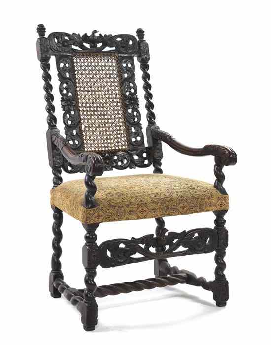 Appraisal: A Charles II Walnut Armchair having a pierce carved horizontal