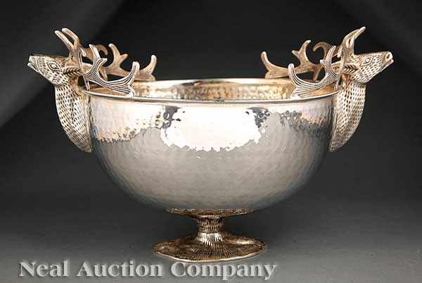 Appraisal: A Decorative Hammered Silverplate Center Bowl with stag's head handles