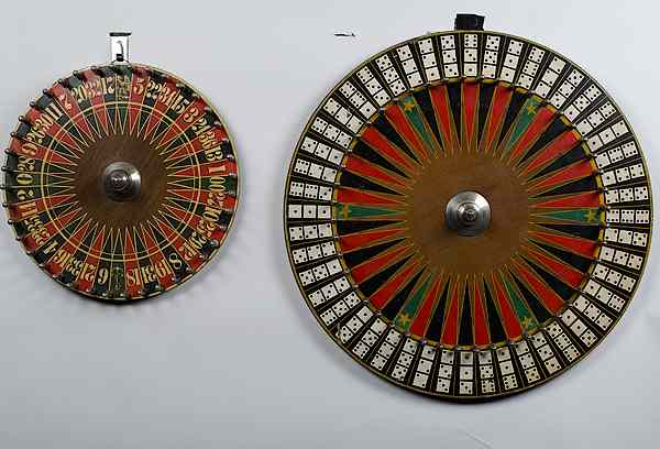 Appraisal: Antique Gaming Wheels American Two gaming wheels including a roulette-style