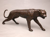 Appraisal: A Life Size Bronze Cheetah Contemporary A realistic cheetah in