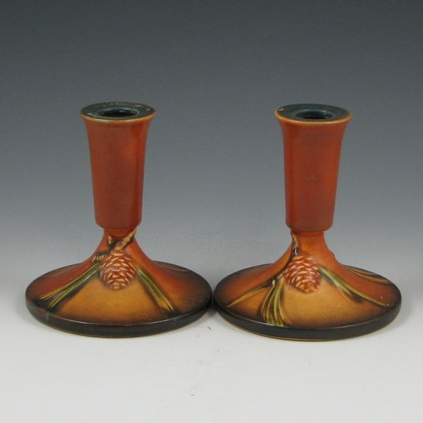 Appraisal: Pair of brown Roseville Pine Cone C- candleholders with original