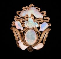 Appraisal: Ornate Opal Brooch Pendant Ornately carved pendant brooch is set