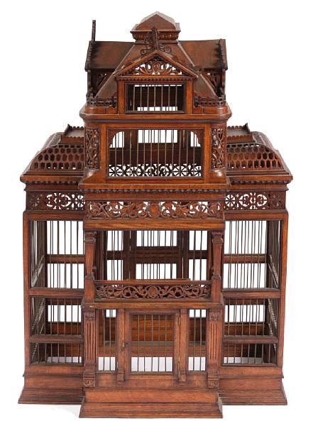 Appraisal: An English oak Palladian style birdcage losses and lacking base