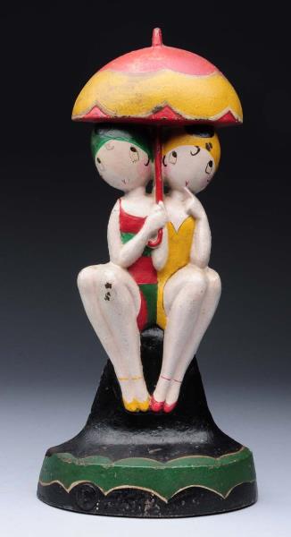 Appraisal: Cast Iron Bathing Beauties Doorstop Made by Hubley and numbered