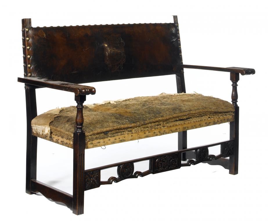 Appraisal: A SPANISH WALNUT SETTEE in th century style with brass-nailed