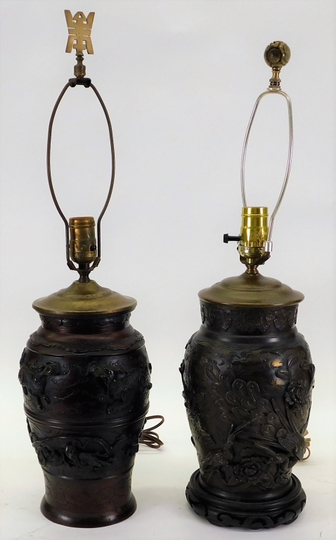 Appraisal: JAPANESE FIGURAL BRONZE URN LAMPS Japan Meiji PeriodOne lamp decorated