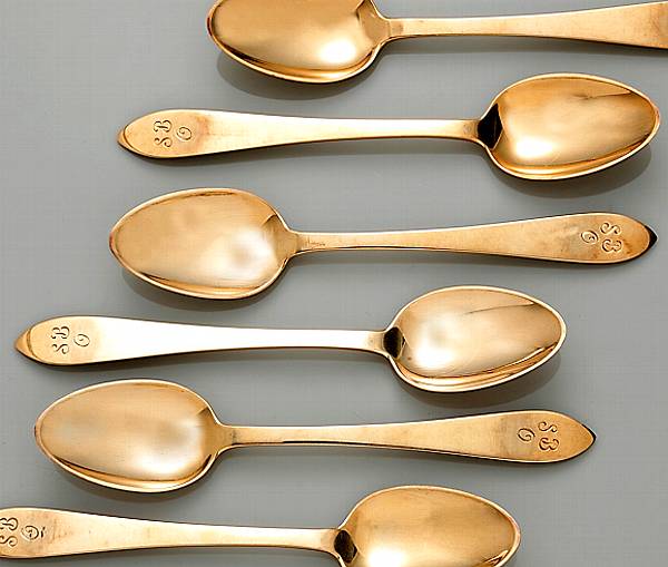 Appraisal: A fourteen karat gold set of twelve coffee spoons Tiffany