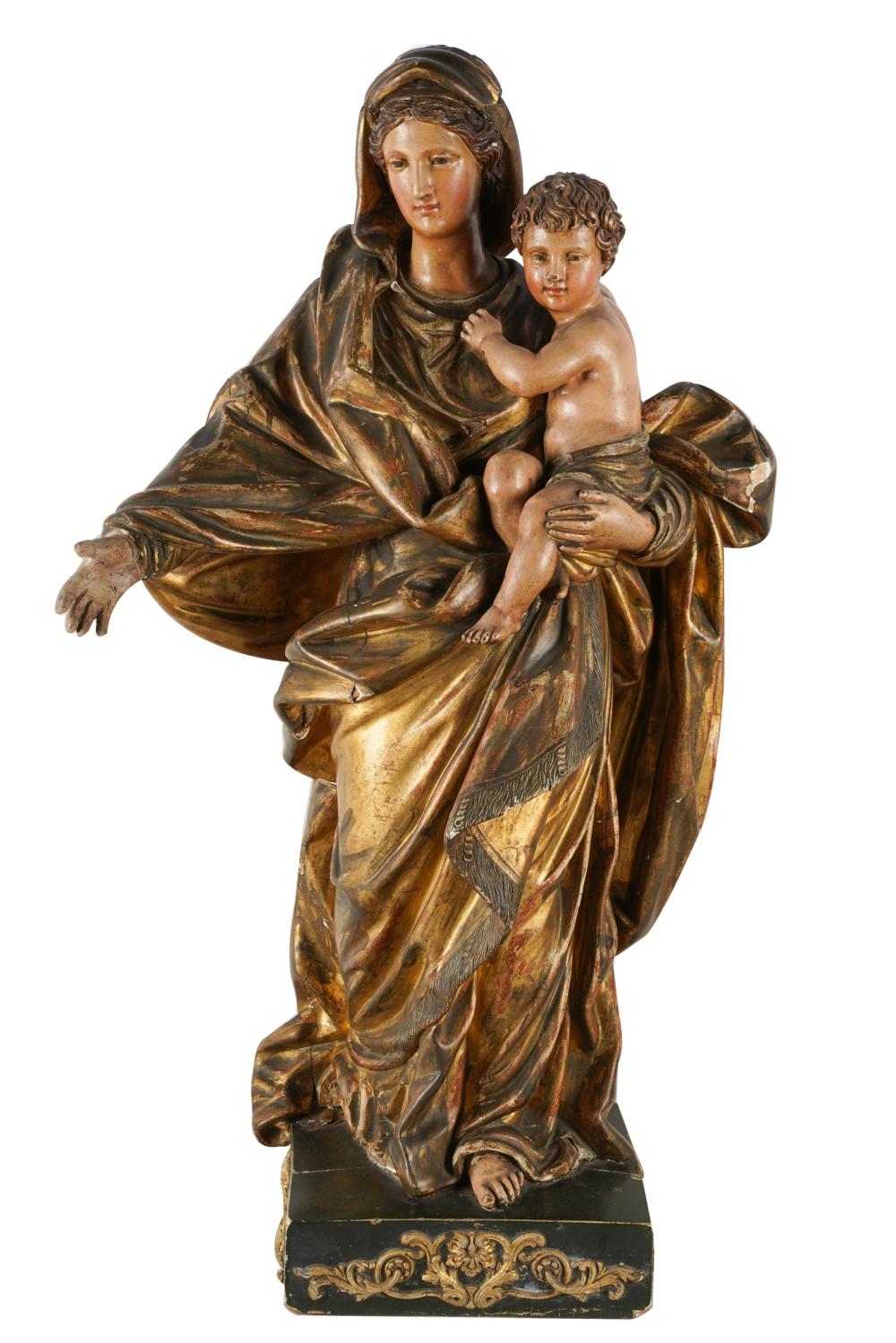 Appraisal: CONTINENTAL CARVED POLYCHROMED MADONNA CHILDCondition with chipped losses and repairs