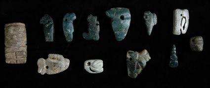 Appraisal: TWELEVE PRE-COLUMBIAN HARDSTONE PENDANTS to in Provenance Property from the