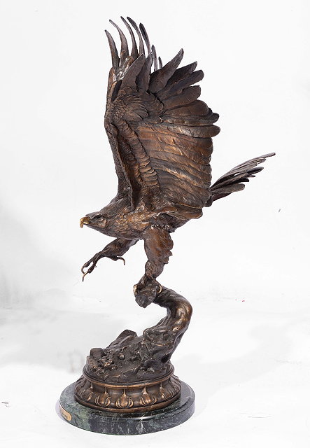 Appraisal: AFTER JULES MOIGNIEZA bronze figure of an eagle alighting on