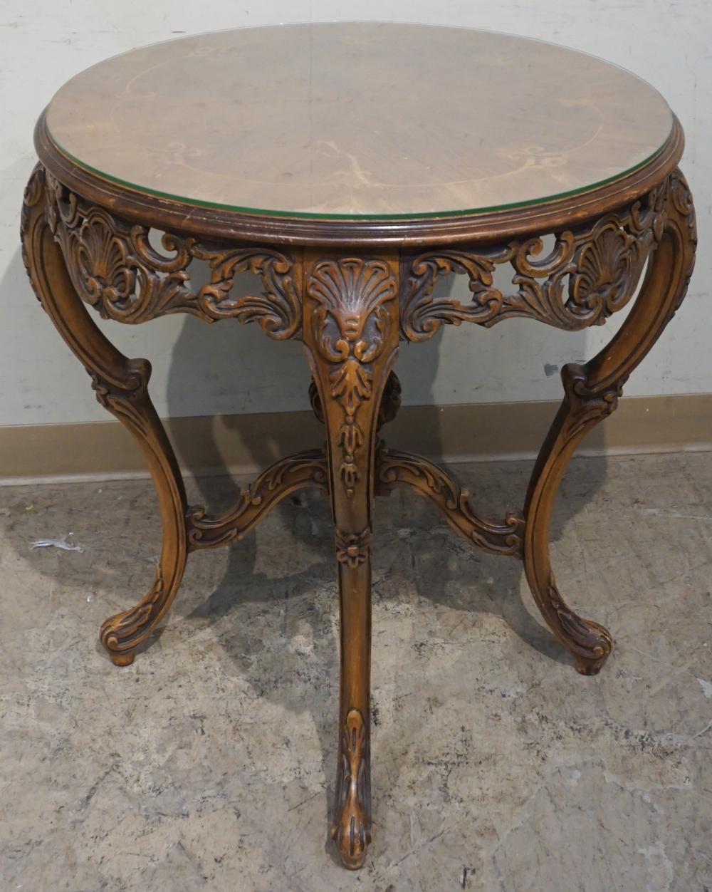 Appraisal: Provincial Style Marquetry and Carved Mahogany Center Table x in