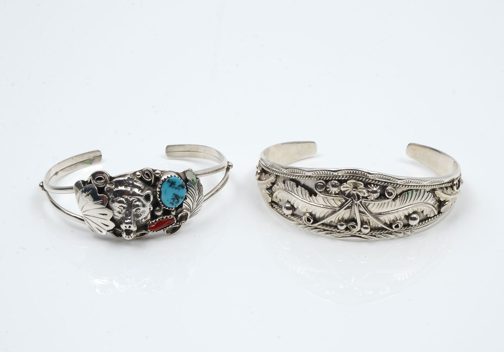 Appraisal: NAVAJO STERLING TURQUOISE CUFF BRACELETS SIGNED RB Intricately designed sterling