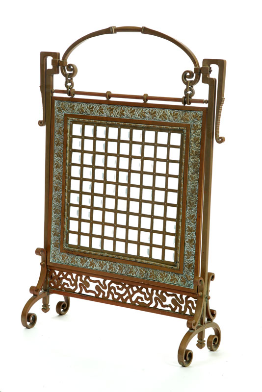 Appraisal: FIRESCREEN American late th century cast brass Brass frame scroll