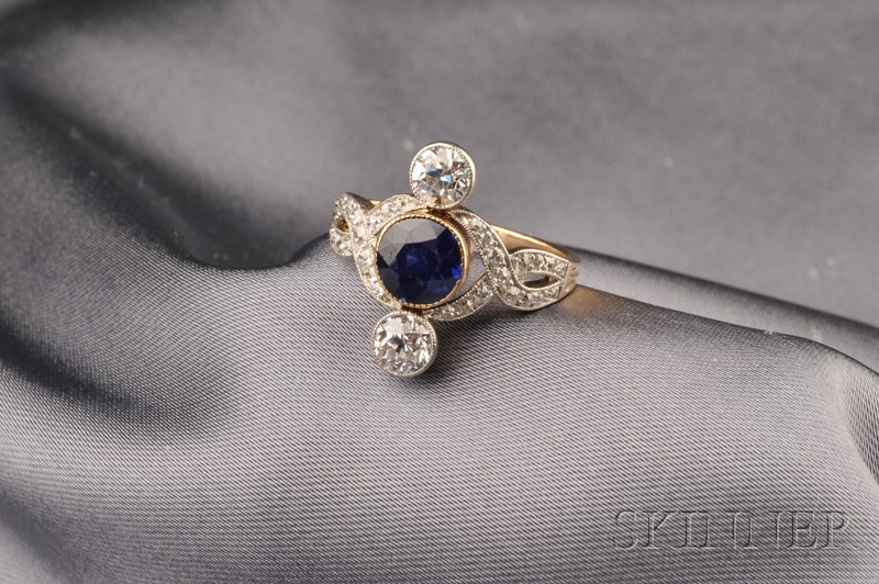 Appraisal: Edwardian Sapphire and Diamond Ring bezel-set with a circular-cut sapphire