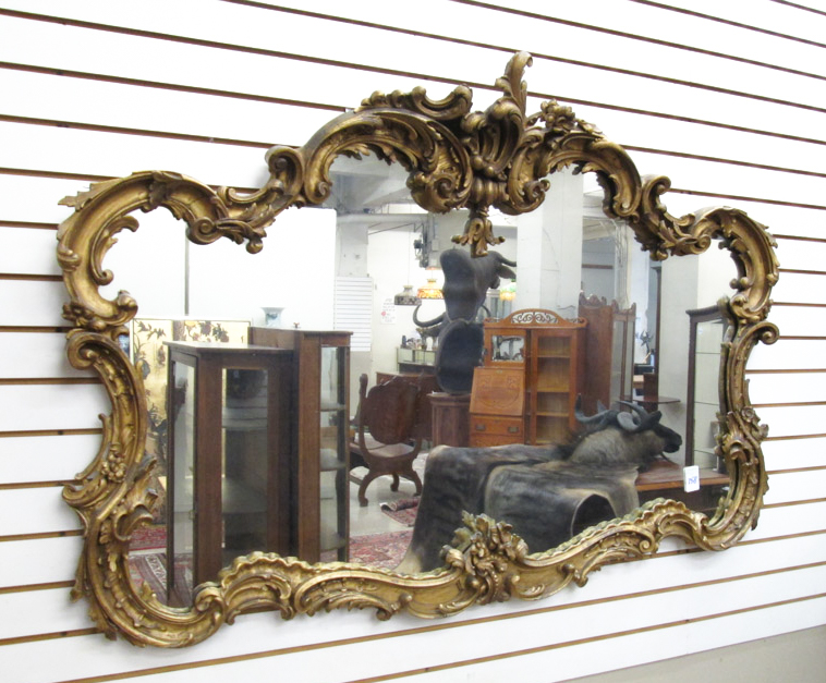 Appraisal: LARGE GILTWOOD AND GESSO FRAMED WALL MIRROR American th century