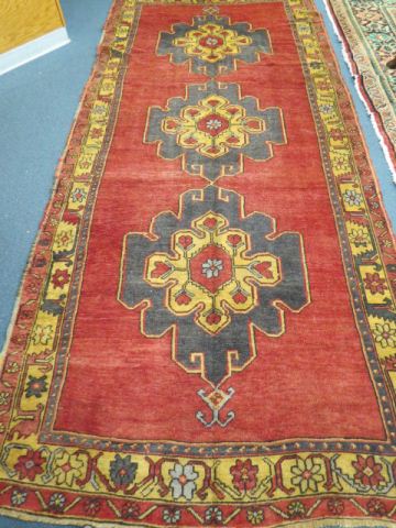 Appraisal: Oushak Turkish Handmade Rug triple floral medallion burgandy field stylized