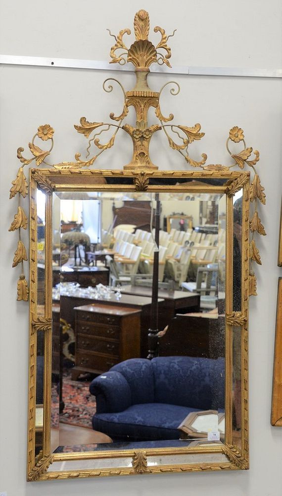 Appraisal: Gilt framed mirror having mirrored frame urn top with scrolling