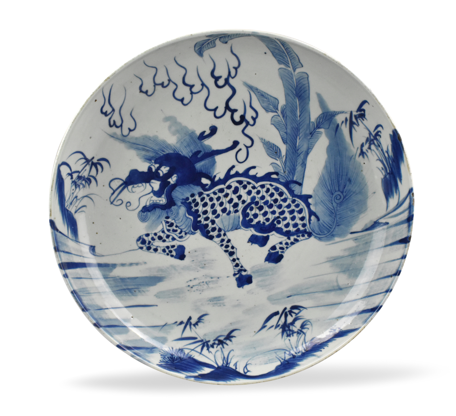 Appraisal: A Chinese blue white charger with large central kirin figure