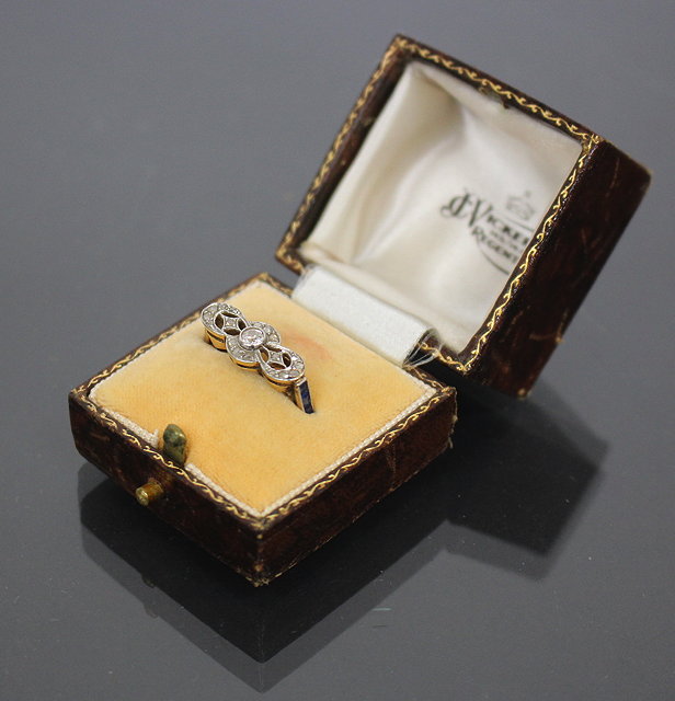 Appraisal: A YELLOW METAL AND DIAMOND TYPE STONE SET DECORATIVE FINGER