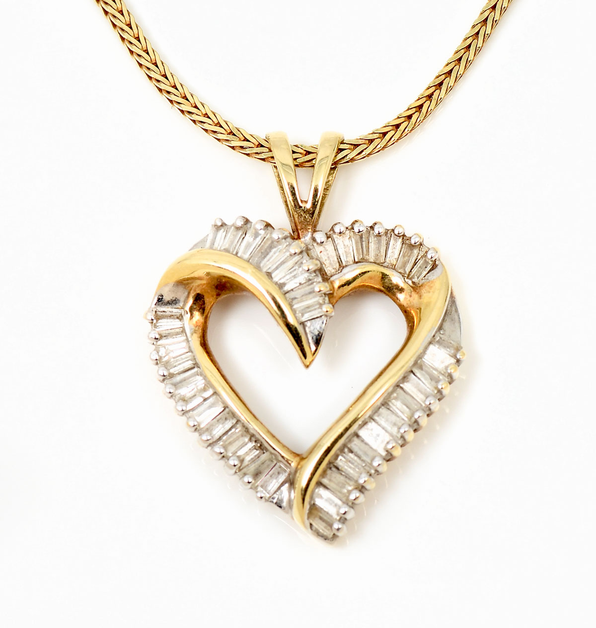 Appraisal: K DIAMOND HEART PENDANT WITH CHAIN K yellow gold heart