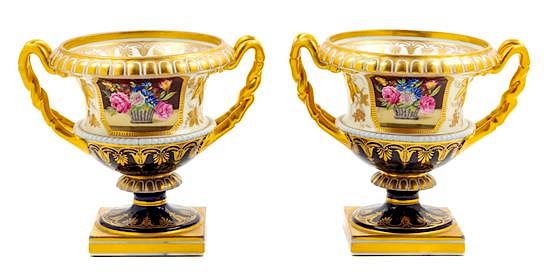 Appraisal: A Pair of English Porcelain Urns Height inches A Pair