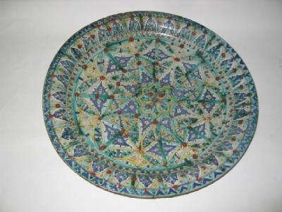 Appraisal: AN ISNIK FAIENCE CHARGER th century of circular form painted