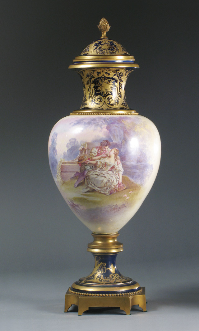 Appraisal: FRENCH SEVRES PORCELAIN COVERED URN th century Ormolu mounted on