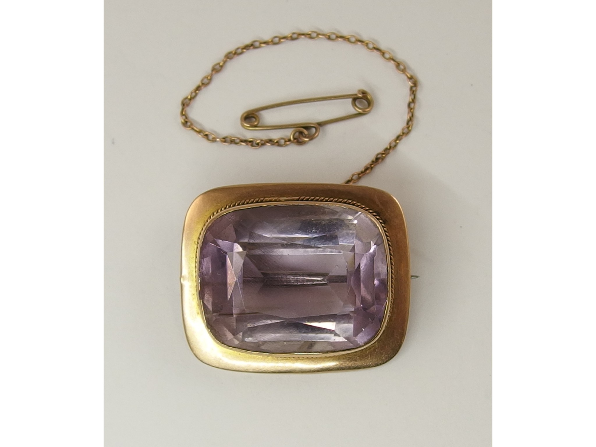 Appraisal: A ct amethyst set brooch