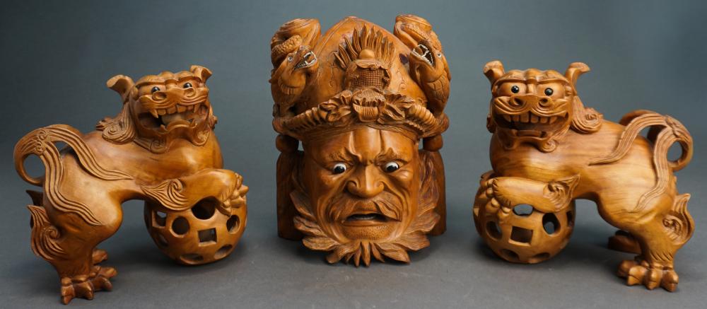 Appraisal: Pair Asian Carved Wood Guardian Lions and Theater Mask