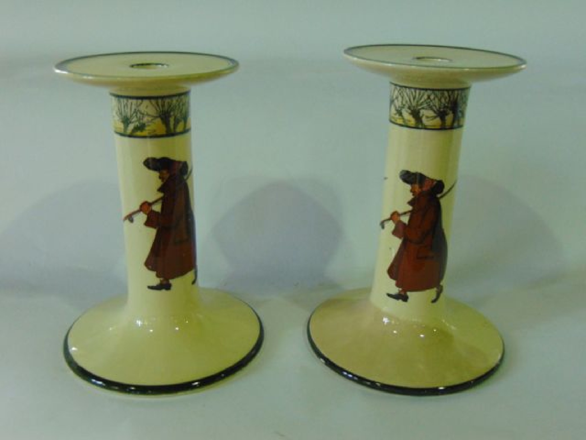 Appraisal: A pair of th century Doulton candlesticks of dumb-bell form