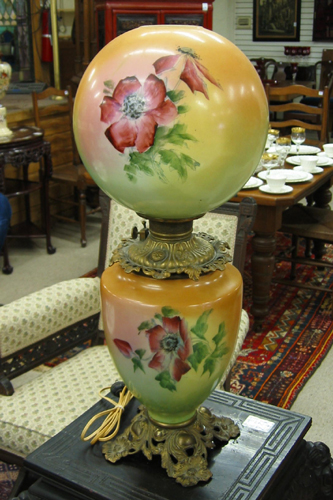 Appraisal: AN AMERICAN GONE-WITH-THE-WIND OIL LAMP having hand painted globular glass