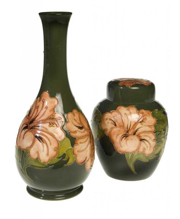 Appraisal: A MOORCROFT HIBISCUS VASE AND GINGER JAR AND COVER DESIGNED