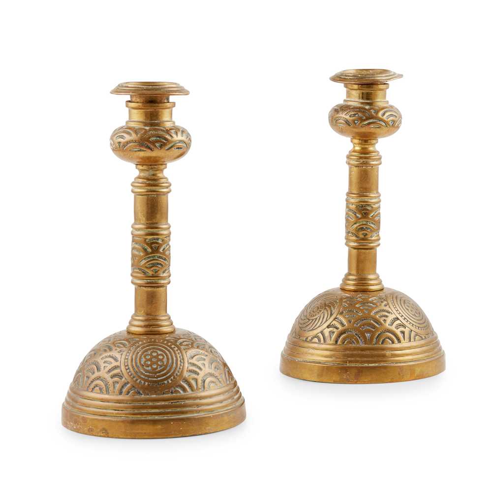 Appraisal: MANNER OF THOMAS JECKYLL PAIR OF AESTHETIC MOVEMENT CANDLESTICKS CIRCA