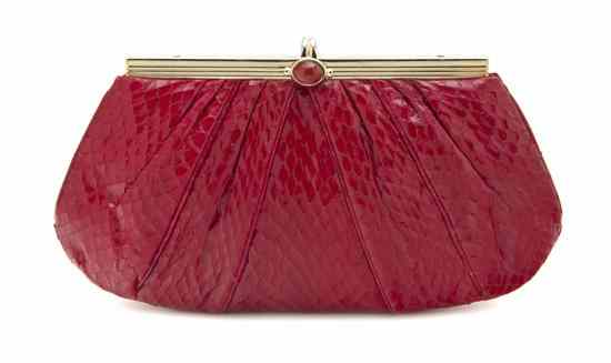 Appraisal: A Judith Leiber Red Snakeskin Evening Clutch goldtone hardware and