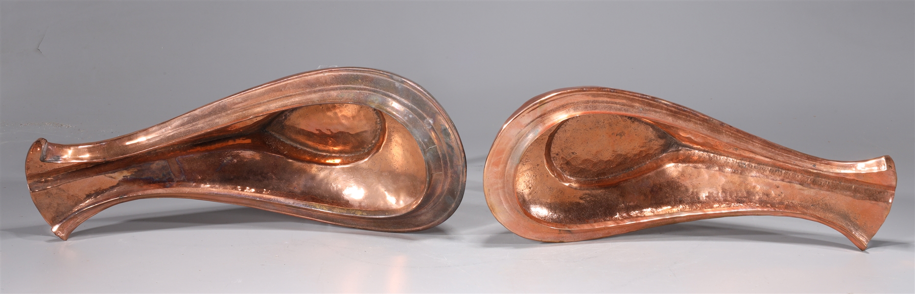 Appraisal: A pair of Yondi Hindi copper water vessels yoni shape