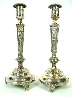 Appraisal: A pair of East European white metal French style candlesticks