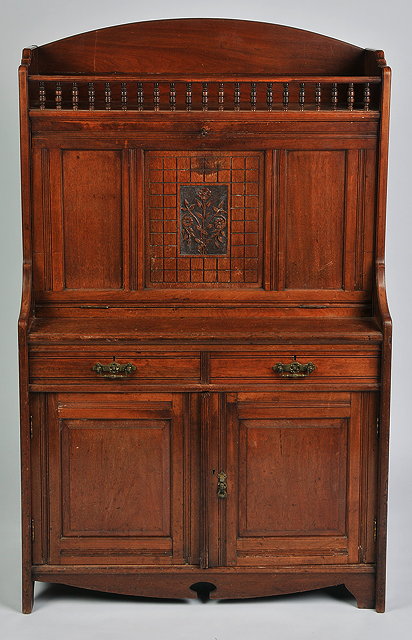 Appraisal: AN AESTHETIC STYLE WALNUT SECRETAIRE CABINET the fall front with