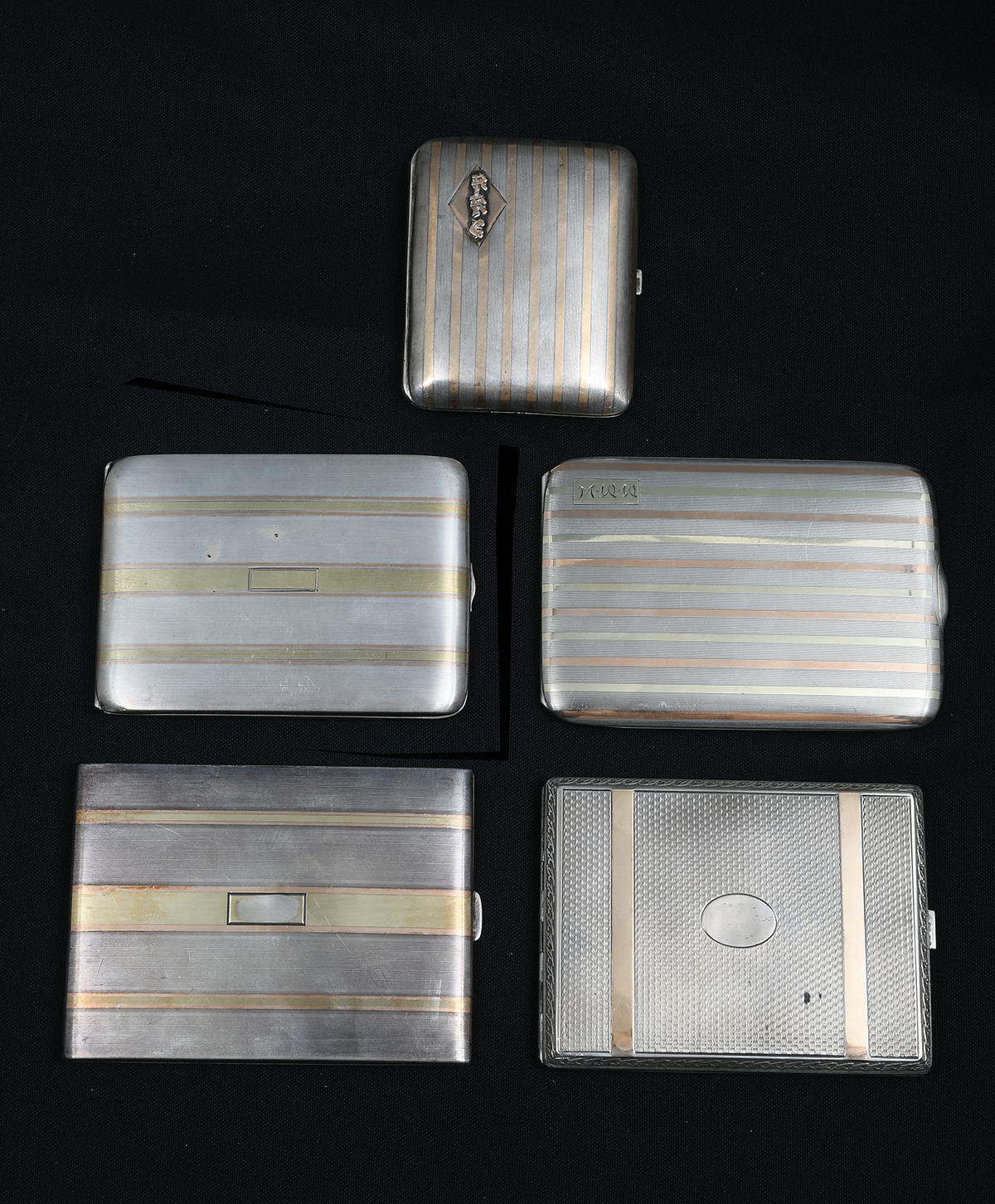 Appraisal: PC K GOLD INLAID SILVER CIGARETTE CASES Comprising - Curved