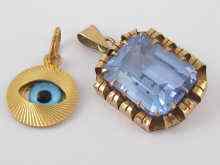 Appraisal: A yellow metal tests carat gold blue stone pendant together