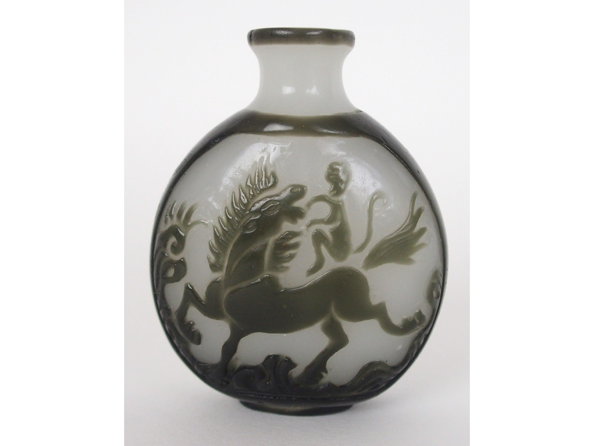 Appraisal: A Chinese overlaid glass snuff bottlecarved with monkeys on horseback