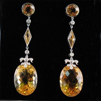 Appraisal: A pair of citrine and diamond drop earrings Set in