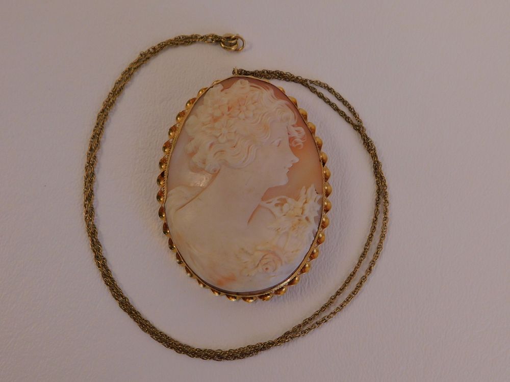 Appraisal: CAMEO NECKLACE W K GOLD FRAME Large Victorian shell cameo