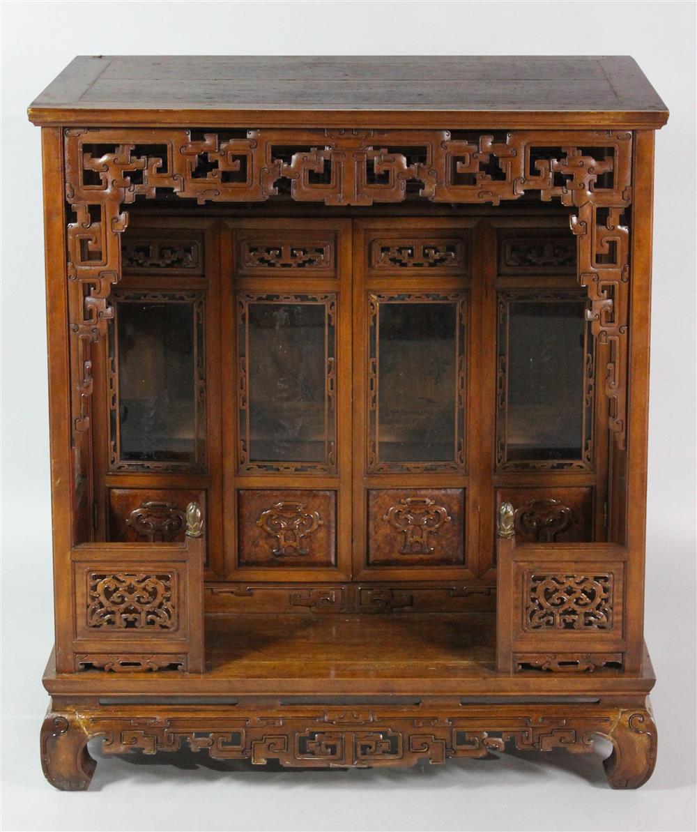 Appraisal: SOUTHEAST ASIAN CARVED WOOD OPEN CABINET with open base and