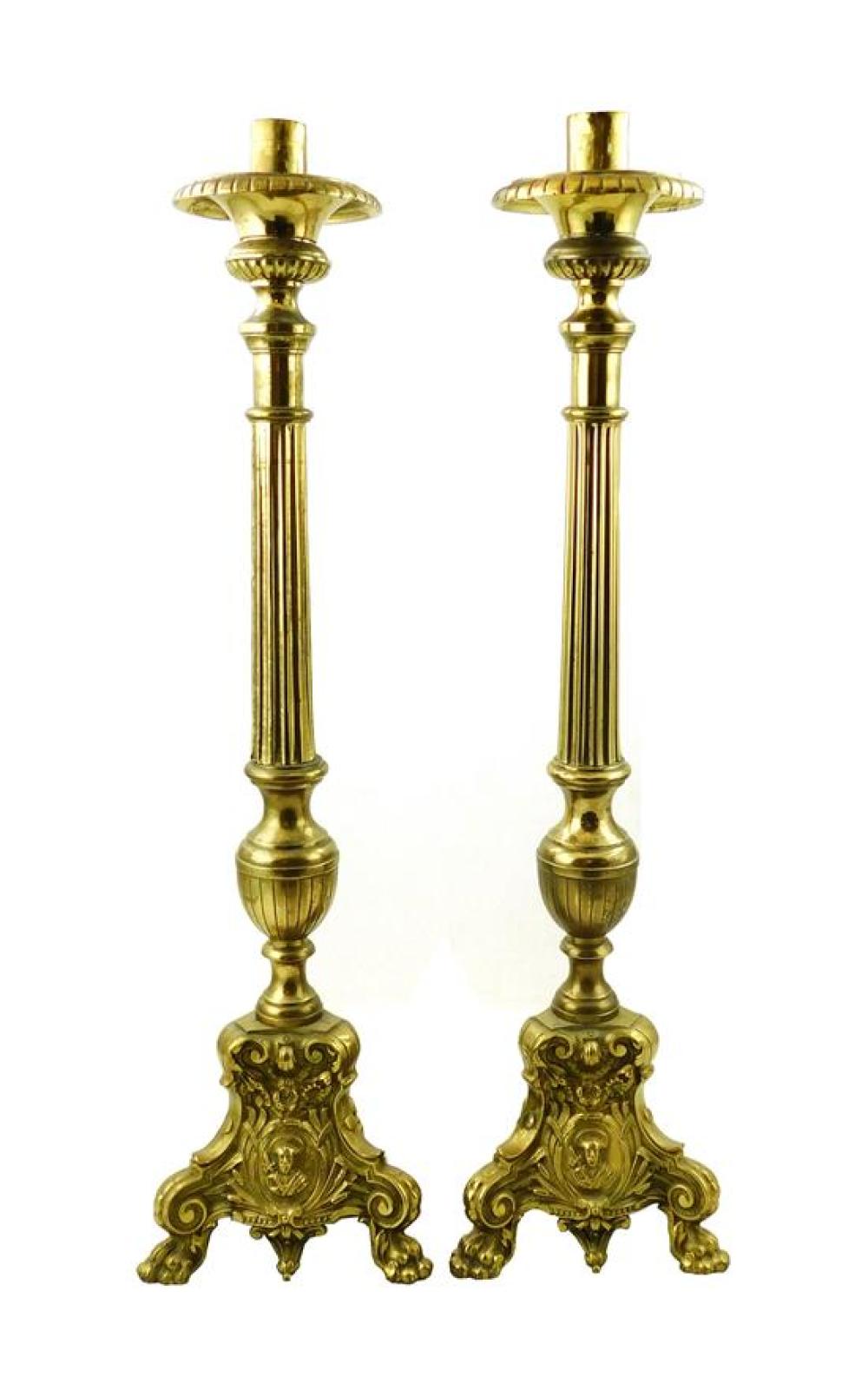 Appraisal: Pair of tall brass candlesticks ornate base with medallions to