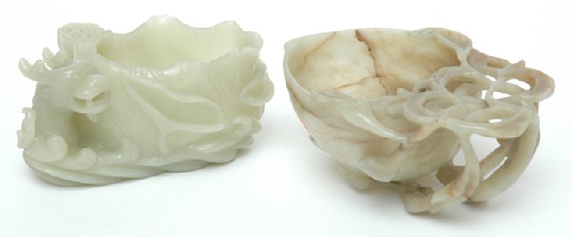 Appraisal: TWO CHINESE JADE BOWLS th th century Carved in the