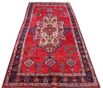 Appraisal: Northwest Persian ca 's Northwest Persian carpet has a ruby