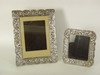 Appraisal: FRAMES - Lot of two sterling repousse picture frames with