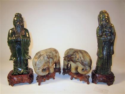 Appraisal: Four Chinese hardstone figuresComprising pair of standing elephants toge Ther